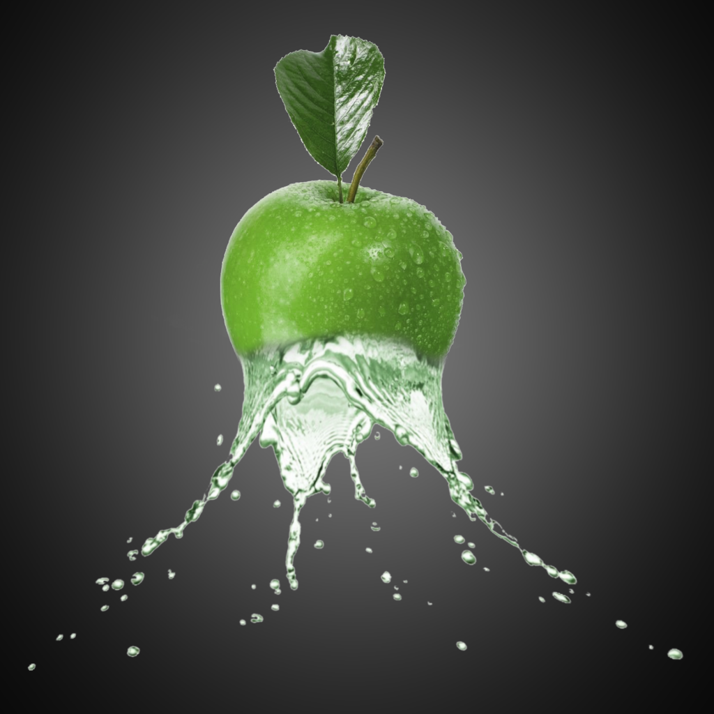 Green apple in green apple juice